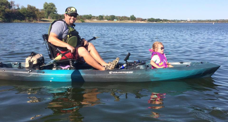 YakAttack team member kayak fishing with family