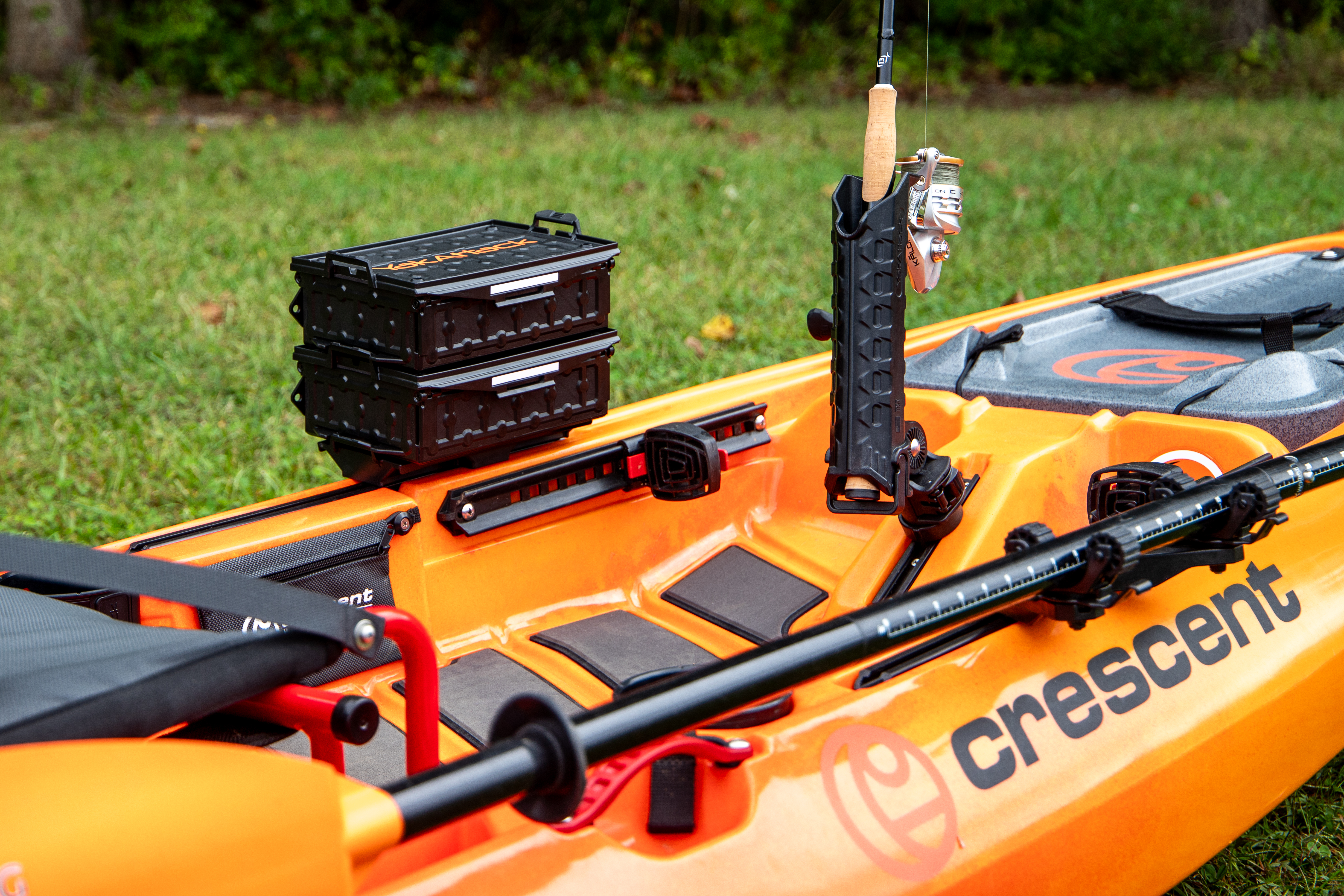 YakAttack TracPak storage box shown on a Crescent Kayak