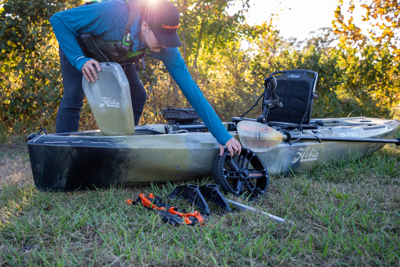 Yakattack scupper cart stored inside the hull of a hobie outback kayak