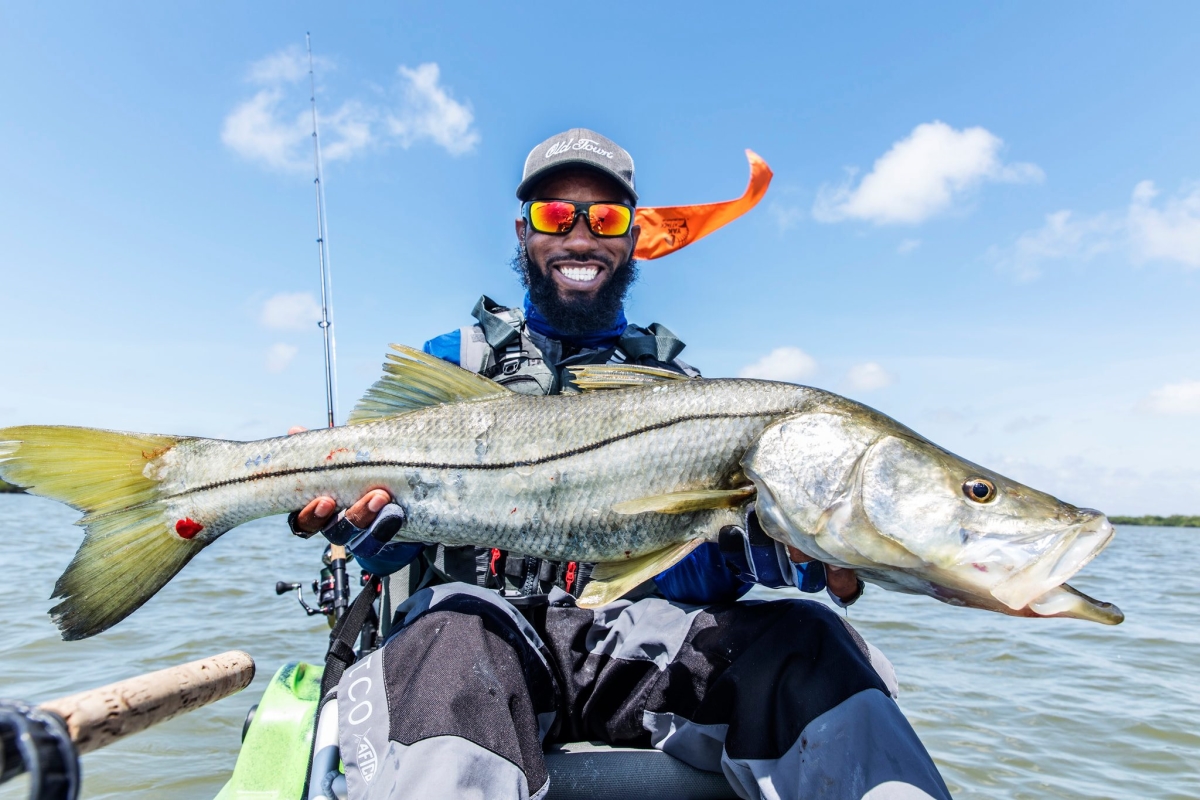 Kwanza Henderson with a Snook from his kayak