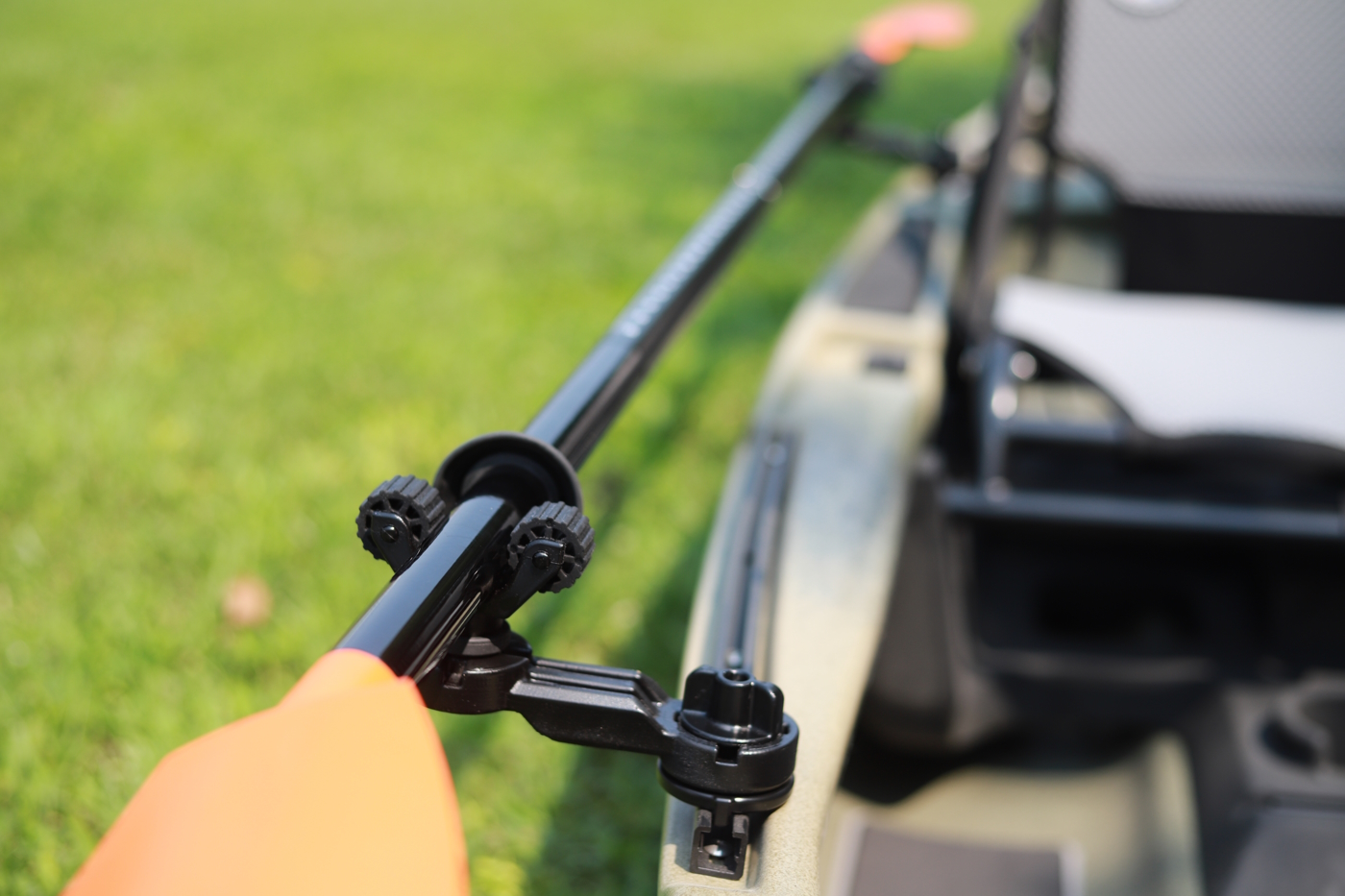 SideArm Track Mounted used to create an offset paddle holder